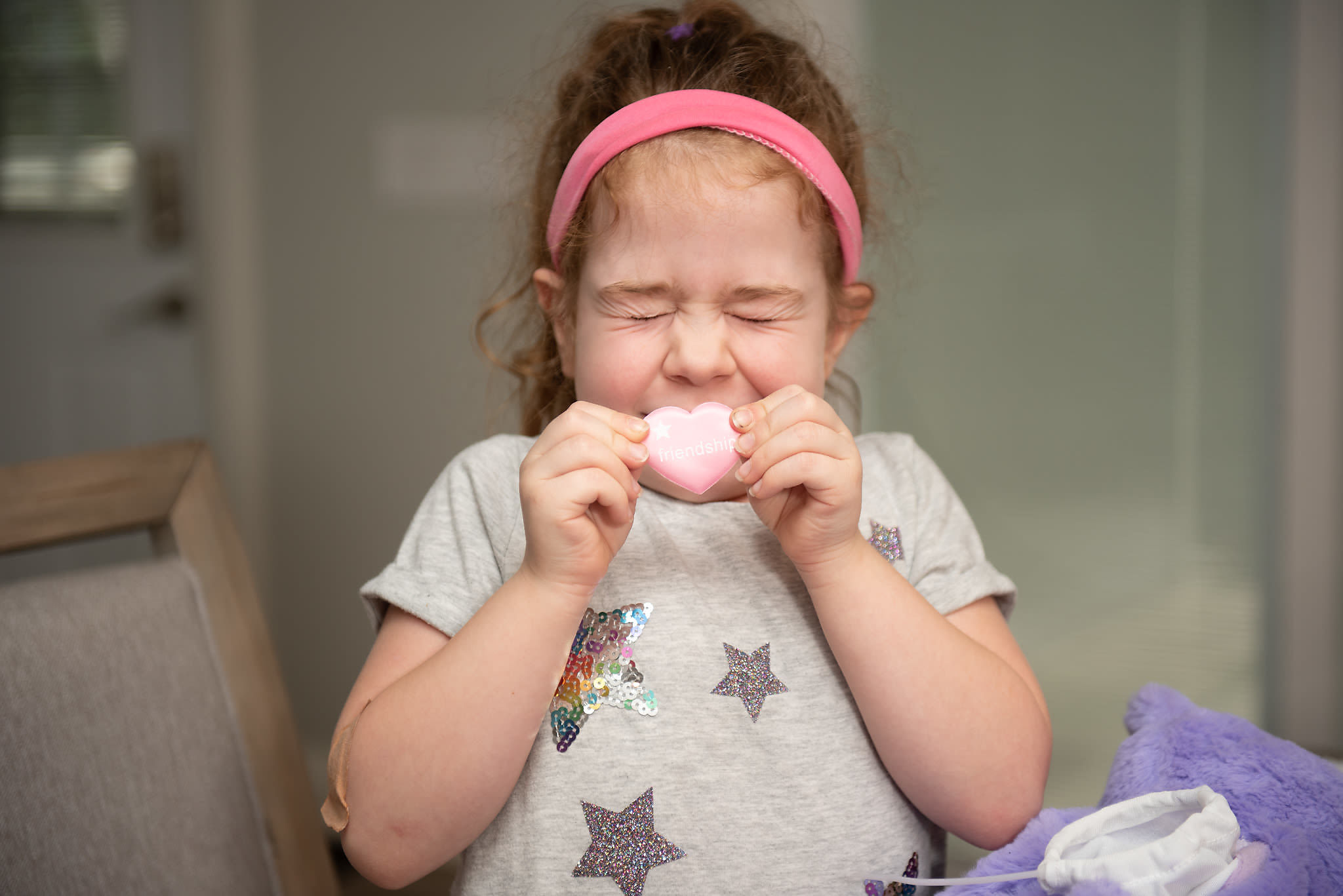 Children stuffing their new plush friends together